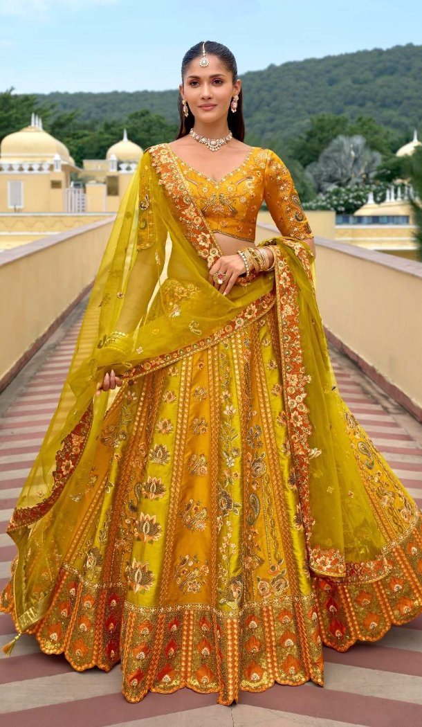 Women Silk Stone Embroidery Work Yellow Wedding Lehenga - 13660213924