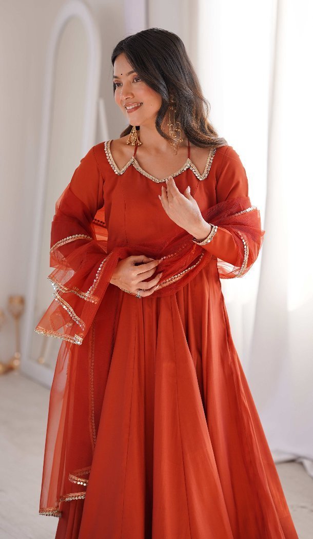Rust Roman Silk Fancy Mirror Work Anarkali Salwar Suit - 219193