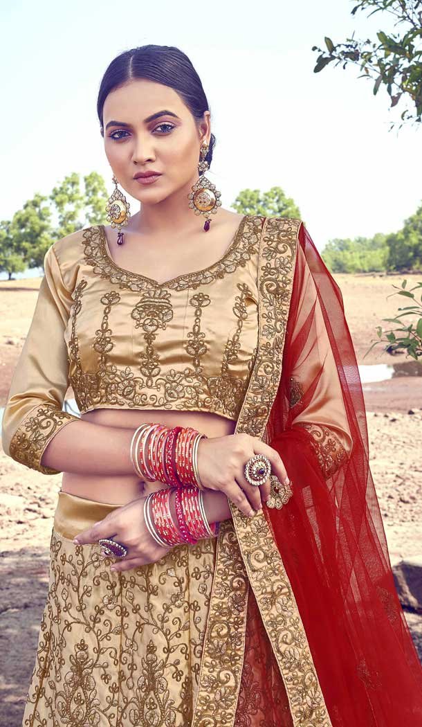 Beige Color Silk Heavy Embroidered Heavy Designer Wear Lehenga Choli -9195109031