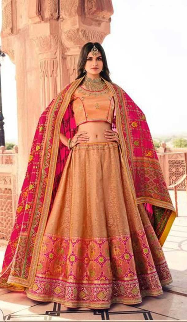 Attractive Peach Color Silk Designer Heavy Bridal Wear Lehenga Choli -1646131751