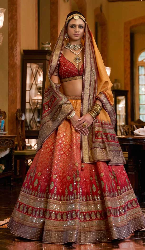 Orange Color Wedding Wear Rajwadi Silk Sparkle Mirror Work Designer Lehenga Choli - 7108174329