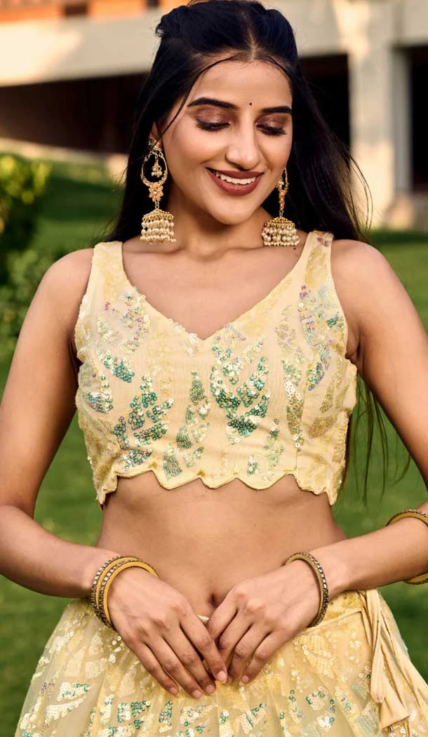 Light Yellow Soft Net Sequins Embroidered Party Wear Lehenga Choli - 9937191342