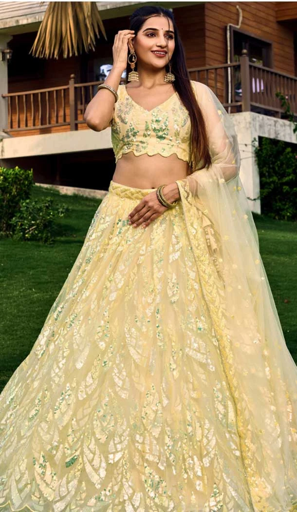 Light Yellow Soft Net Sequins Embroidered Party Wear Lehenga Choli - 9937191342