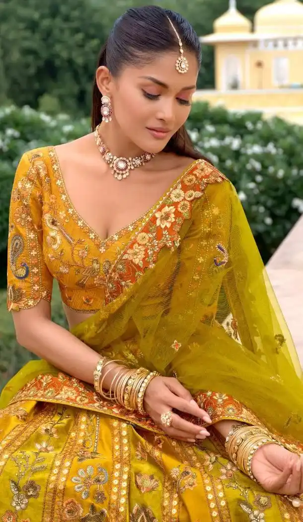 Women Silk Stone Embroidery Work Yellow Wedding Lehenga - 13660213924