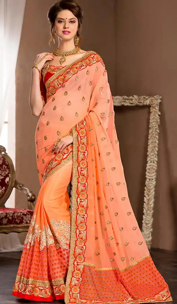 Fancy Designer Saris In Georgette Fabric and Orange Color with Stitched Blouse | FH444870081