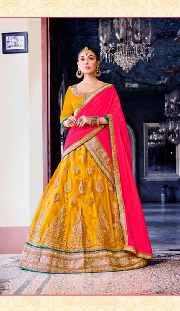 Embroidery Traditional Wear Lehenga Choli in Net and Yellow Color | FH531780373