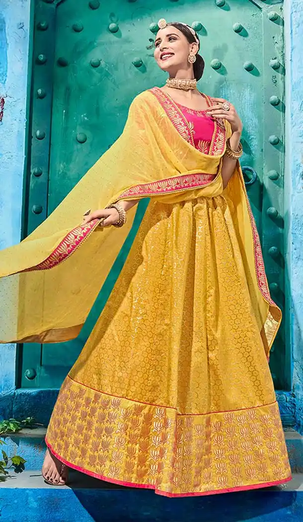 Gorgeous Yellow Color Geneva silk Lehenga Choli | 372644484