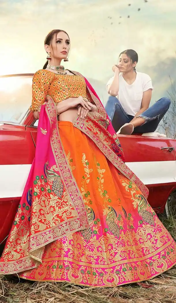 Fancy Orange Color Banarasi Silk Jacquard Traditional Wear Lehenga Choli -674384741