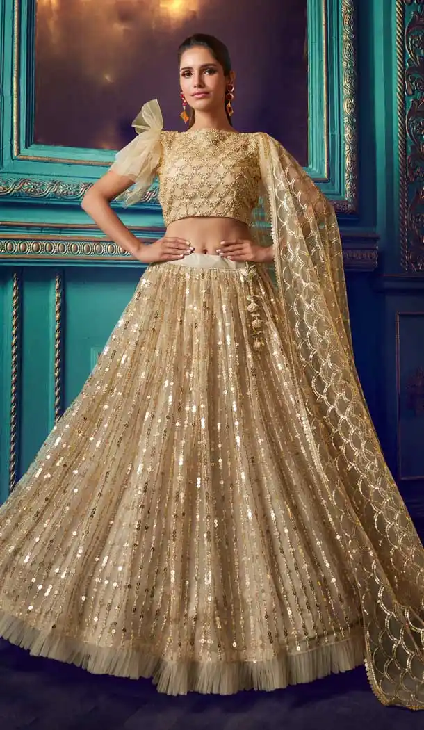 Melodic Gold Color Soft Net Heavy Designer Party Wear Lehenga Choli -8898106127