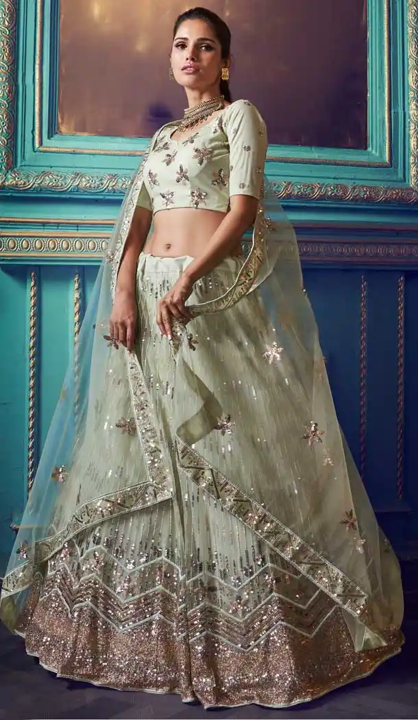 Charming Pista Color Soft Net Heavy Designer Party Wear Lehenga Choli -8898106137
