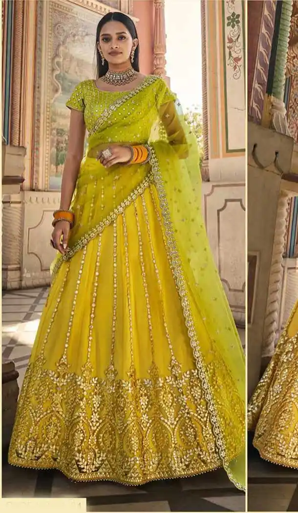 Tantalizing Yellow Color Net Heavy Designer Wedding Wear Lehenga Choli -8927106358