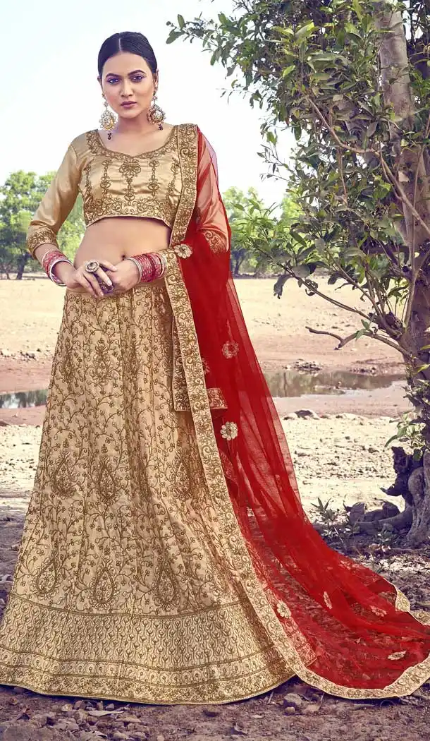 Beige Color Silk Heavy Embroidered Heavy Designer Wear Lehenga Choli -9195109031