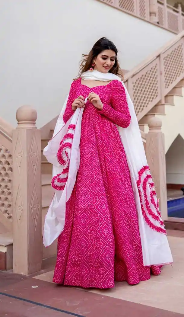 Rani Pink Color Pure Maslin Bandhej Style & Flaired Gown With Dupatta -380120451