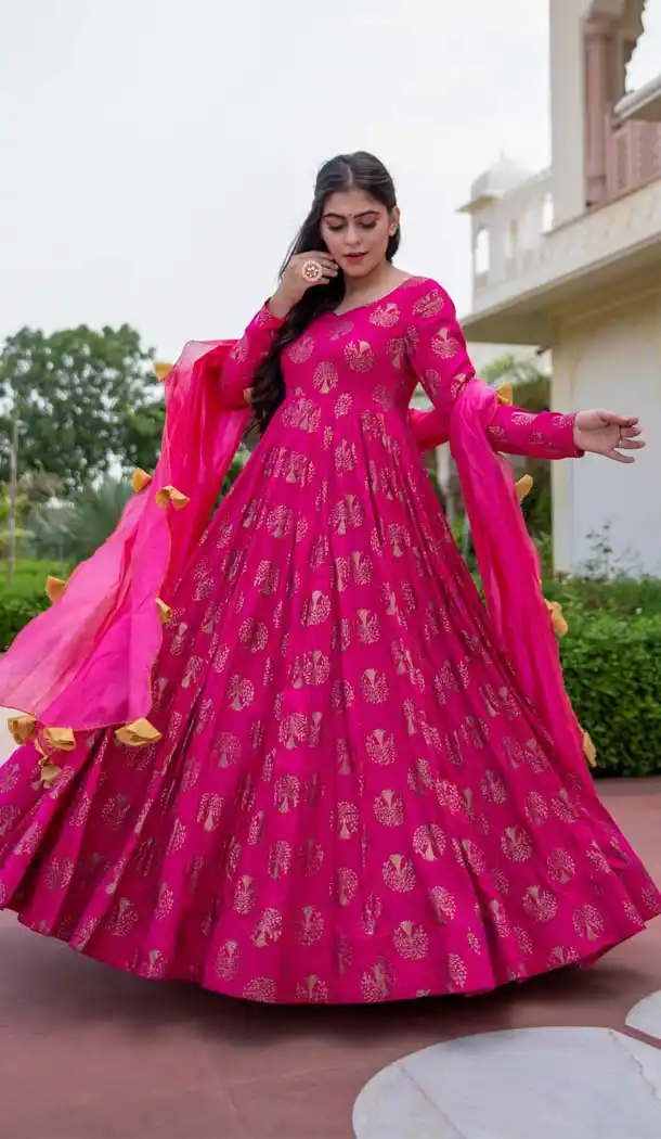 Mesmerizing Rani Pink Color Pure Maslin Bandhej Style & Flaired Gown With Dupatta -380120454