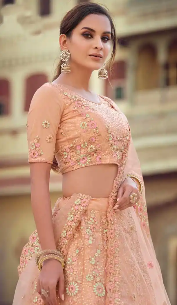 Light Orange Color Soft Net Designer Sangeet Wear Lehenga Choli -1749132782