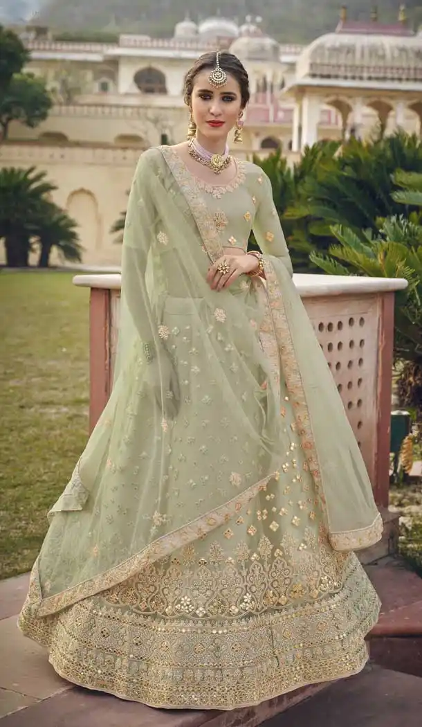 Attractive Pista Green Color Net Designer Party Wear Women Lehenga Choli -3585148264