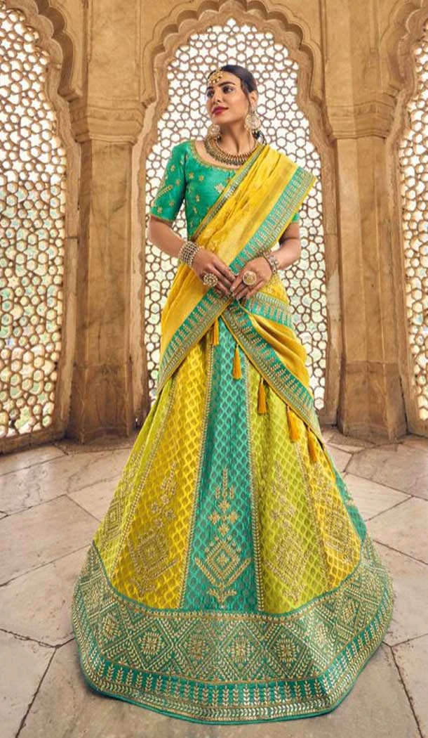 Yellow Color Embroidery Work Banarasi Silk Wedding Wear Lehenga Choli -4531155270