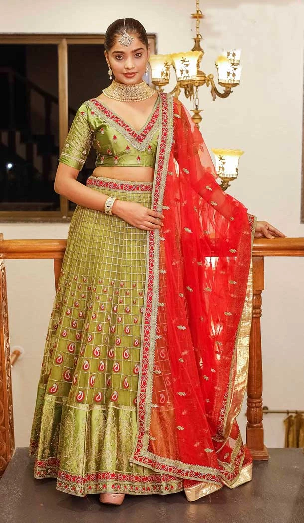 Olive Green Color Net With Silk Embroidery Work Wedding Wear Lehenga Choli -5055159517